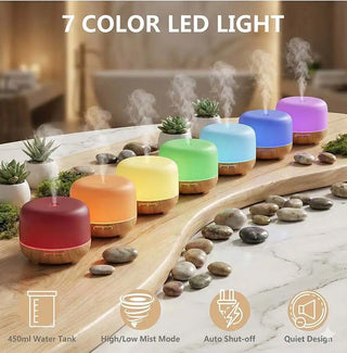 Panoramica dei 7 colori LED del diffusore per cromoterapia. Icone in basso mostrano le caratteristiche: 500ml, BPA Free, Auto-Stop e Silenzioso.