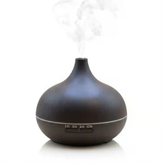 Diffusore di aromi a ultrasuoni da 500ml di colore scuro su sfondo bianco.